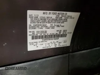2014 Ford Taurus SEL z VIN 1FAHP2E85EG146469, wystawiony jako Copart lot #59506195 z przebiegiem 158 124 mil mil oraz Szkoda całkowita • Salvage title. Historia ofert i sprzedaży dostępna na DreamBid. Obrazek 12.