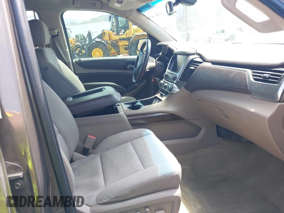 2016 Chevrolet Tahoe LS with VIN 1GNSCAKC7GR419294, listed as a IAAI auction lot 42020006 with 83,945 mi miles and . Bid and sale history available at DreamBid. Image 5.