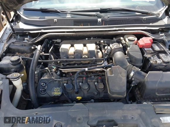 2014 Ford Taurus SEL with VIN 1FAHP2E81EG122928, listed as a IAAI auction lot 41492582 with 200,411 mi miles. Bid and sale history available at carsss.com. Image 10.