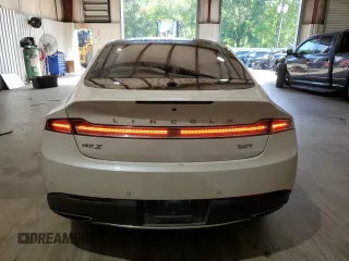 2017 Lincoln MKZ Reserve z VIN 3LN6L5E94HR644680, wystawiony jako Copart lot #52596035 z przebiegiem 124 142 mil mil oraz Szkody całkowita. Historia ofert i sprzedaży dostępna na DreamBid. Obrazek 6.