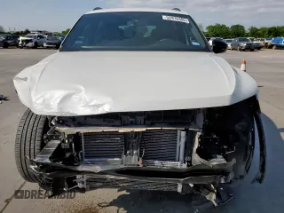 2022 Volkswagen Tiguan SE R-Line Black z VIN 3VVCB7AX0NM161028, wystawiony jako Copart lot #52976305 z przebiegiem 21 938 mil mil oraz Szkoda całkowita • Salvage title. Historia ofert i sprzedaży dostępna na DreamBid. Obrazek 5.