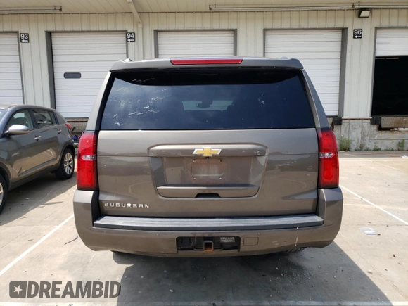 2015 Chevrolet Suburban LS with VIN 1GNSCHKC8FR628406, listed as a Copart auction lot 60682805 with 195,151 mi miles and Salvage title. Bid and sale history available at DreamBid. Image 6.