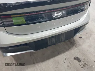 2024 Hyundai Sonata SEL z VIN KMHL64JA8RA401941, wystawiony jako IAAI lot #42085349 z przebiegiem 3722 mil mil oraz . Historia ofert i sprzedaży dostępna na DreamBid. Obrazek 17.