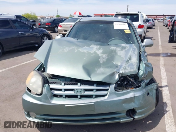 2003 Hyundai Accent GL with VIN KMHCG35C53U277734, listed as a IAAI auction lot 42085996 with 108,369 mi miles. Bid and sale history available at carsss.com. Image 12.