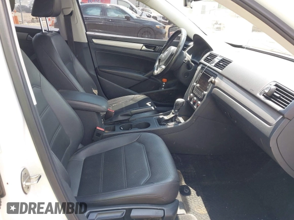 2015 Volkswagen Passat Wolfsburg Edition with VIN 1VWAT7A37FC112814, listed as a IAAI auction lot 42607166 with 123,429 mi miles and . Bid and sale history available at DreamBid. Image 5.