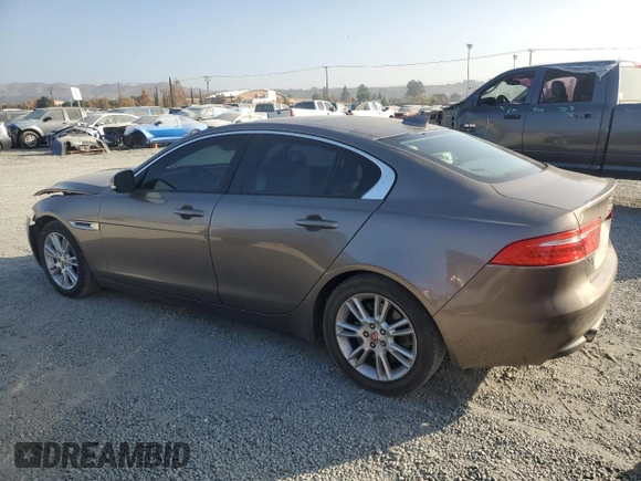 2017 Jaguar XE 25t Premium with VIN SAJAD4BG6HA957704, listed as a Copart auction lot 83630294 with 114,794 mi miles and Salvage Title. Bid and sale history available at carsss.com. Image 2.