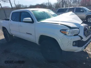 2019 Toyota Tacoma SR with VIN 5TFCZ5ANXKX181774, listed as a IAAI auction lot 41868597 with 154,998 mi miles and . Bid and sale history available at DreamBid. Image 1.