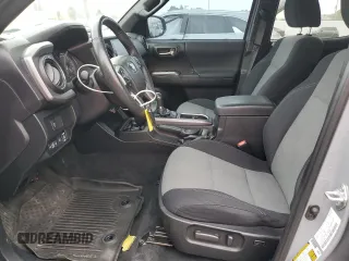 2021 Toyota Tacoma SR with VIN 3TMCZ5AN4MM402889, listed as a Copart auction lot 59942695 with 61,504 mi miles and Salvage title. Bid and sale history available at DreamBid. Image 7.