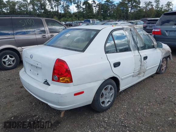 2004 Hyundai Accent GL z VIN KMHCG45C24U559935, wystawiony jako IAAI lot #40487927 z przebiegiem Nie podano mil oraz . Historia ofert i sprzedaży dostępna na DreamBid. Obrazek 4.