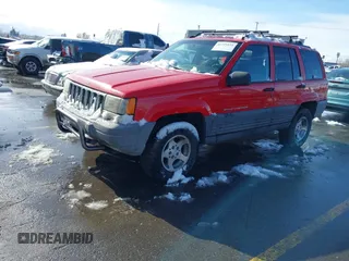1996 Jeep Grand Cherokee Laredo with VIN 1J4GZ58Y8TC374929, listed as a IAAI auction lot 41725111 with 196,723 mi miles. Bid and sale history available at carsss.com. Image 2.