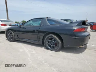 1999 Mitsubishi 3000GT z VIN JA3AM44H6XY002443, wystawiony jako Copart lot #57155505 z przebiegiem 201 588 mil mil oraz Czysty tytuł • Clean title. Historia ofert i sprzedaży dostępna na DreamBid. Obrazek 2.