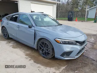 2024 Honda Civic Sport Touring z VIN 19XFL1G85RE004486, wystawiony jako IAAI lot #42052473 z przebiegiem 25 003 mil mil oraz . Historia ofert i sprzedaży dostępna na DreamBid. Obrazek 1.