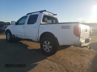 2006 Nissan Frontier LE with VIN 1N6AD07W96C458675, listed as a Copart auction lot 86922704 with 208,357 mi miles and Salvage title. Bid and sale history available at DreamBid. Image 2.
