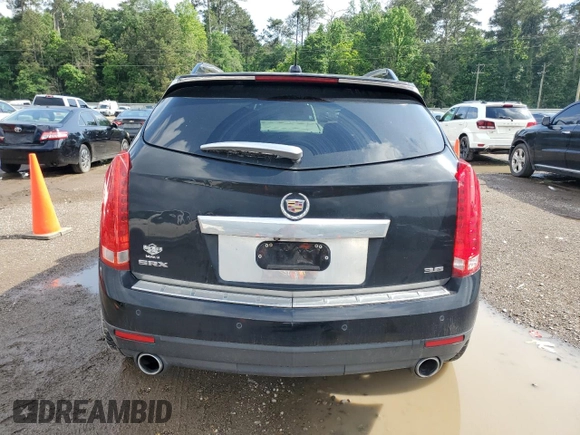 2015 Cadillac SRX Premium Collection with VIN 3GYFNDE32FS572480, listed as a Copart auction lot 54456725 with 82,573 mi miles and Salvage title. Bid and sale history available at DreamBid. Image 6.