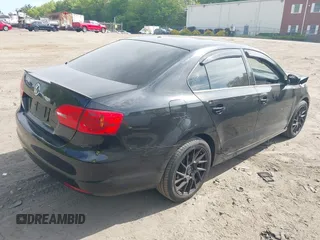 2013 Volkswagen Jetta S with VIN 3VW2K7AJ9DM280634, listed as a IAAI auction lot 42240749 with 93,472 mi miles and . Bid and sale history available at DreamBid. Image 4.