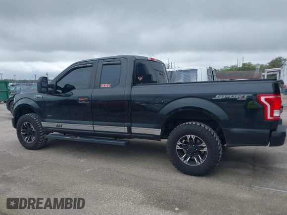 2015 Ford F-150 XLT with VIN 1FTEX1EP2FFC73234, listed as a IAAI auction lot 41661655 with 150,371 mi miles. Bid and sale history available at carsss.com. Image 14.