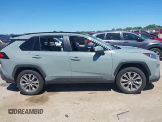 2021 Toyota RAV4 XLE Premium with VIN 2T3C1RFV0MW140682, listed as a IAAI auction lot 42315813 with 98,267 mi miles and . Bid and sale history available at DreamBid. Image 13.