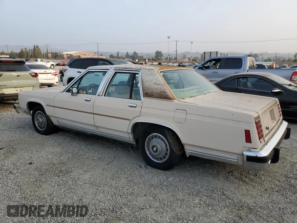 1986 Ford Crown Victoria z VIN 2FABP43F4GX118923, wystawiony jako Copart lot #76413794 z przebiegiem 74 097 mil mil oraz Tytuł czysty. Historia ofert i sprzedaży dostępna na DreamBid. Obrazek 2.