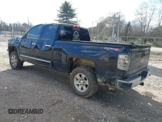 2014 Chevrolet Silverado 1500 LTZ with VIN 1GCVKSEC1EZ105678, listed as a IAAI auction lot 41299817 with 142,014 mi miles and . Bid and sale history available at DreamBid. Image 3.