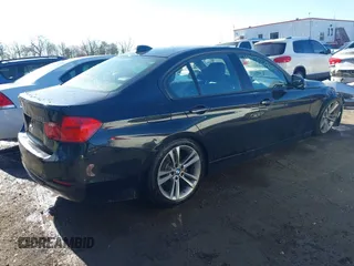 2014 BMW 3 Series 328i xDrive with VIN WBA3B5G51ENS09521, listed as a IAAI auction lot 41872960 with 110,999 mi miles and . Bid and sale history available at DreamBid. Image 4.