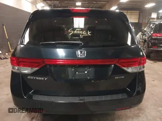 2014 Honda Odyssey Touring with VIN 5FNRL5H94EB105745, listed as a IAAI auction lot 41744012 with 77,032 mi miles and . Bid and sale history available at DreamBid. Image 16.