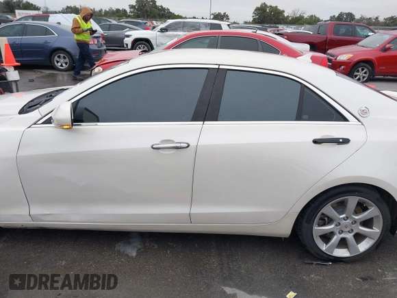 2013 Cadillac ATS Luxury z VIN 1G6AB5RA1D0156368, wystawiony jako IAAI lot #41283194 z przebiegiem 95 770 mil mil oraz . Historia ofert i sprzedaży dostępna na DreamBid. Obrazek 14.