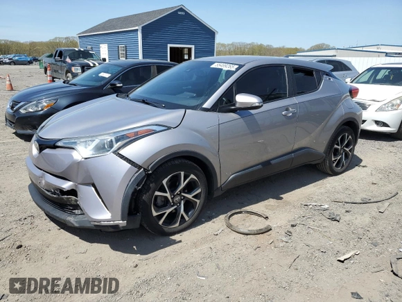 2018 Toyota C-HR XLE z VIN NMTKHMBX8JR001011, wystawiony jako Copart lot #55469265 z przebiegiem 106 938 mil mil oraz Szkoda całkowita • Salvage title. Historia ofert i sprzedaży dostępna na DreamBid. Obrazek 1.