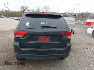2013 Jeep Grand Cherokee Laredo with VIN 1C4RJEAG2DC573970, listed as a IAAI auction lot 41892914 with 185,050 mi miles. Bid and sale history available at carsss.com. Image 16.