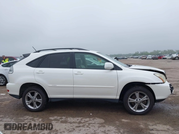 2007 Lexus RX 400h z VIN JTJGW31U572003651, wystawiony jako IAAI lot #42163515 z przebiegiem 358 648 mil mil oraz . Historia ofert i sprzedaży dostępna na DreamBid. Obrazek 13.