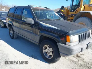 1996 Jeep Grand Cherokee Laredo with VIN 1J4GZ58S3TC345107, listed as a IAAI auction lot 41661884 with 179,175 mi miles. Bid and sale history available at carsss.com. Image 1.