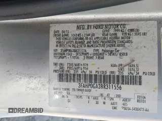 2011 Ford Fusion S with VIN 3FAHP0GA3BR311556, listed as a IAAI auction lot 41668511 with 200,159 mi miles. Bid and sale history available at carsss.com. Image 9.