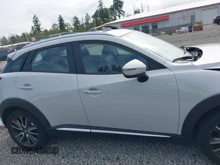 2017 Mazda CX-3 Grand Touring z VIN JM1DKFD70H0159621, wystawiony jako IAAI lot #42331482 z przebiegiem 55 166 mil mil oraz . Historia ofert i sprzedaży dostępna na DreamBid. Obrazek 13.