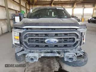 2021 Ford F-150 XL with VIN 1FTEW1C58MFB54623, listed as a Copart auction lot 55072405 with 115,374 mi miles and Salvage title. Bid and sale history available at DreamBid. Image 5.