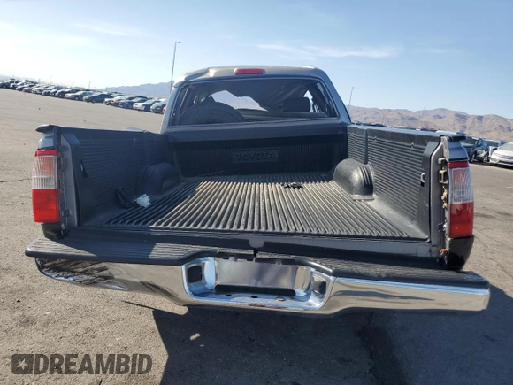 1997 Toyota T100 DX z VIN JT4TN12D0V0035777, wystawiony jako Copart lot #54016555 z przebiegiem 170 779 mil mil oraz Nie do naprawy • Non repairable. Historia ofert i sprzedaży dostępna na DreamBid. Obrazek 6.