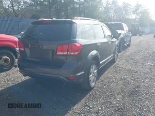 2016 Dodge Journey SXT with VIN 3C4PDDBG3GT118383, listed as a IAAI auction lot 41801212 with 136,068 mi miles and . Bid and sale history available at carsss.com. Image 4.