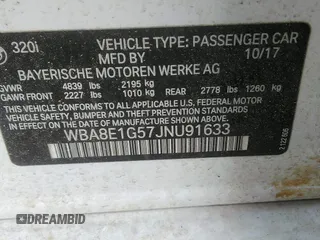 2018 BMW 3 Series 320i with VIN WBA8E1G57JNU91633, listed as a IAAI auction lot 42065119 with 55,062 mi miles. Bid and sale history available at carsss.com. Image 9.