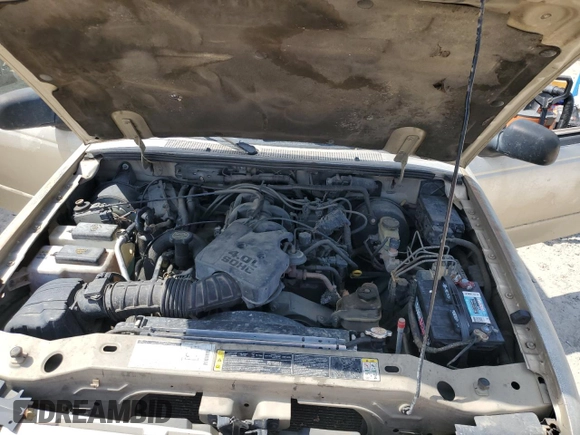 2002 Ford Ranger XLT Appearance with VIN 1FTYR44E32TA51614, listed as a Copart auction lot 61653905 with 194,762 mi miles and Salvage title. Bid and sale history available at DreamBid. Image 11.