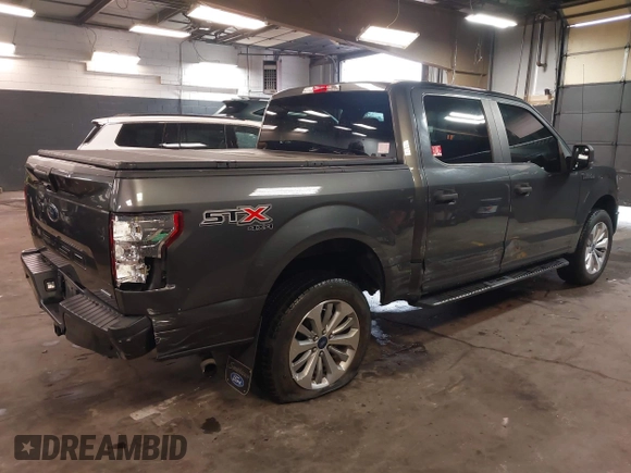 2018 Ford F-150 XL with VIN 1FTEW1EP5JFC37436, listed as a IAAI auction lot 41807561 with 133,159 mi miles and . Bid and sale history available at carsss.com. Image 4.