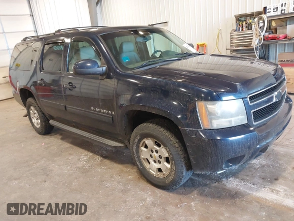 2009 Chevrolet Suburban LT w/1LT with VIN 1GNFK26319R272557, listed as a IAAI auction lot 42138238 with 223,599 mi miles. Bid and sale history available at carsss.com. Image 1.
