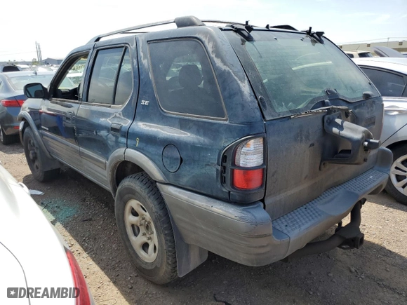 2001 Isuzu Rodeo S with VIN 4S2CK58W614344850, listed as a Copart auction lot 63807664 with 176,203 mi miles and Salvage Title. Bid and sale history available at carsss.com. Image 2.