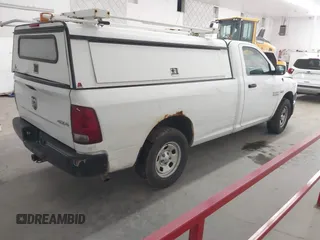 2014 Ram 1500 Tradesman z VIN 3C6JR7DT6EG285109, wystawiony jako IAAI lot #42306741 z przebiegiem 218 286 mil mil oraz . Historia ofert i sprzedaży dostępna na DreamBid. Obrazek 4.