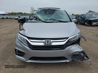 2019 Honda Odyssey EX-L z VIN 5FNRL6H7XKB049729, wystawiony jako Copart lot #55953075 z przebiegiem 129 194 mil mil oraz Szkoda całkowita • Salvage title. Historia ofert i sprzedaży dostępna na DreamBid. Obrazek 5.