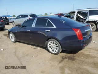 2015 Cadillac CTS Luxury AWD with VIN 1G6AX5SX7F0125516, listed as a Copart auction lot 61072735 with 111,448 mi miles and Clean title. Bid and sale history available at DreamBid. Image 2.