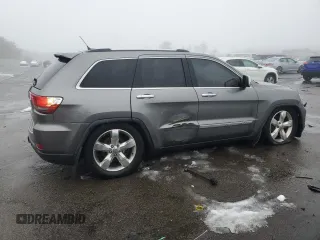 2013 Jeep Grand Cherokee Overland with VIN 1C4RJFCTXDC555233, listed as a Copart auction lot 44535045 with 104,721 mi miles and Clean Title. Bid and sale history available at carsss.com. Image 3.