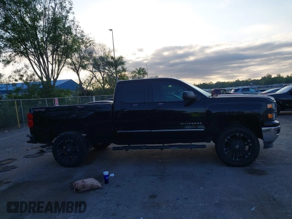 2015 Chevrolet Silverado 1500 LT with VIN 1GCVKREC3FZ241773, listed as a IAAI auction lot 42054178 with 146,304 mi miles. Bid and sale history available at carsss.com. Image 12.