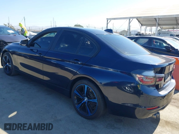 2015 BMW 3 Series 328i with VIN WBA3C1C50FK124300, listed as a IAAI auction lot 40112372 with 142,591 mi miles and . Bid and sale history available at carsss.com. Image 3.
