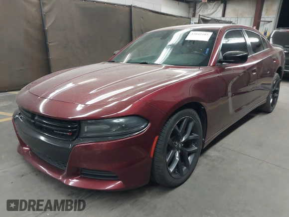 2020 Dodge Charger SXT with VIN 2C3CDXBG4LH101261, listed as a IAAI auction lot 42045103 with 114,349 mi miles. Bid and sale history available at carsss.com. Image 2.