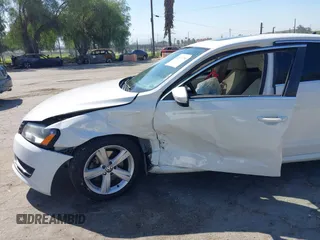 2012 Volkswagen Passat SE with VIN 1VWBP7A3XCC109832, listed as a IAAI auction lot 41657750 with 192,653 mi miles. Bid and sale history available at carsss.com. Image 6.
