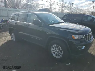 2018 Jeep Grand Cherokee Laredo E with VIN 1C4RJFAG3JC179587, listed as a Copart auction lot 50071395 with 137,828 mi miles and Clean Title. Bid and sale history available at carsss.com. Image 4.