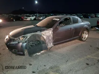 2005 Mazda RX-8 with VIN JM1FE17N950157715, listed as a Copart auction lot 76077944 with 102,174 mi miles and Salvage Title. Bid and sale history available at carsss.com. Image 1.